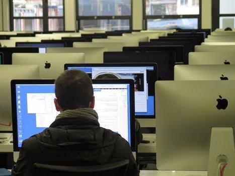 student with computer